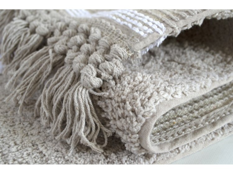 Коврик Irya. Nell gri серого цвета с бахромой